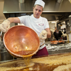Our supplier Confiserie des Hautes Vosges busy preparing candies with copper cauldron at their workplace.