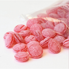 Opened bag of 250g of bulk CDHV's 100% natural cherry frosted candies.