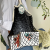 Black écru Filt 1860's 100% cotton net shopping bag with books in it