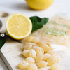 Opened bag of 250g of bulk CDHV's 100% natural lemon & verbena frosted candies.