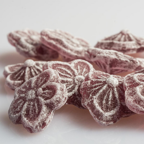 Bulk of CDHV's violet 100% natural frosted candies.
