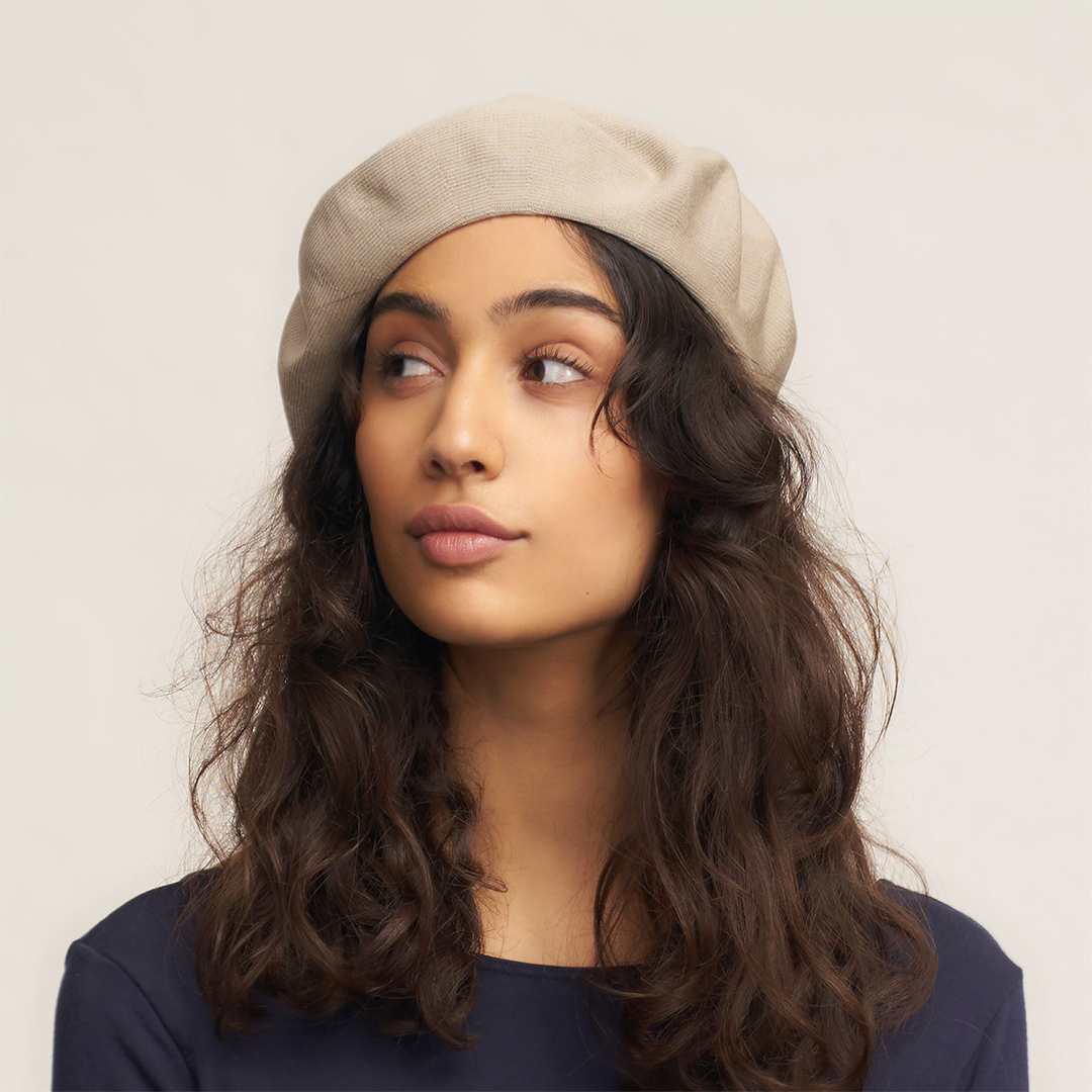 Laulhère's 100% cotton authentic summer beret - beige - worn by a model