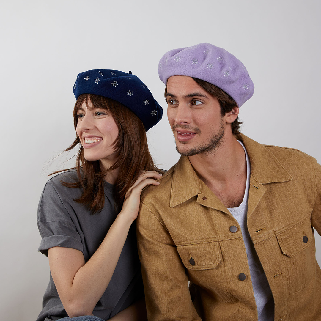 Two models wearing berets