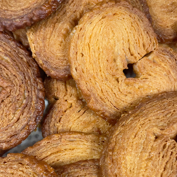 Bulk of soy-free pure butter palmiers.