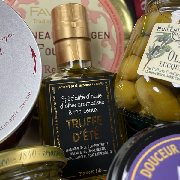 Focus on the olive oil with truffles, stuffed plums and the olives