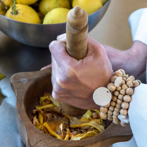 Staff busy preparing lemon for the lemon curd. Traditional handmade process.