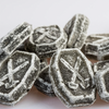 Bulk of CDHV's briquette (liquorice - anise) 100% natural frosted candies.
