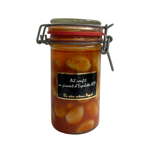 Jar of Artisan Popol's candied garlic with Espelette pepper. Net weight: 140g