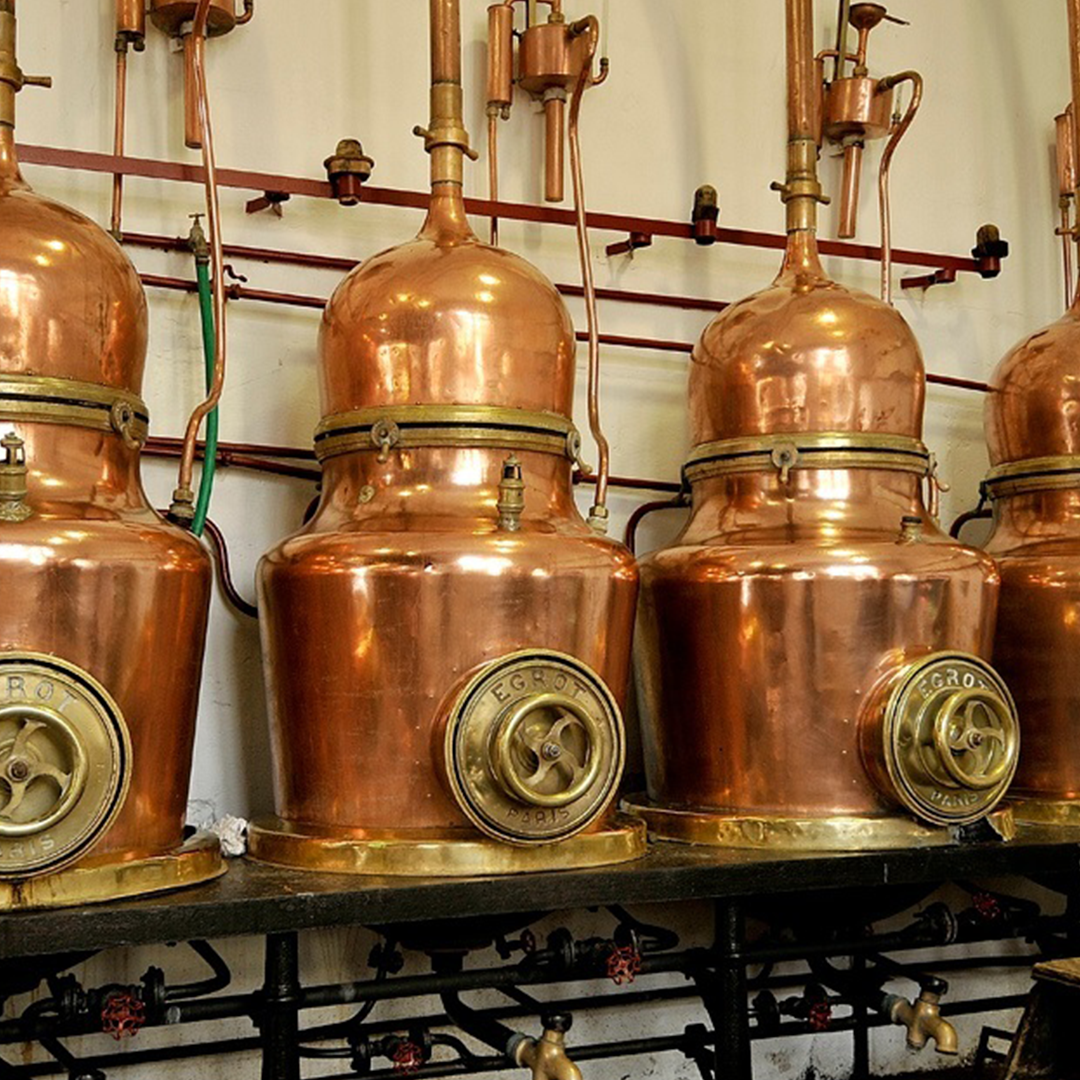 Copper stills at Combier distillery 