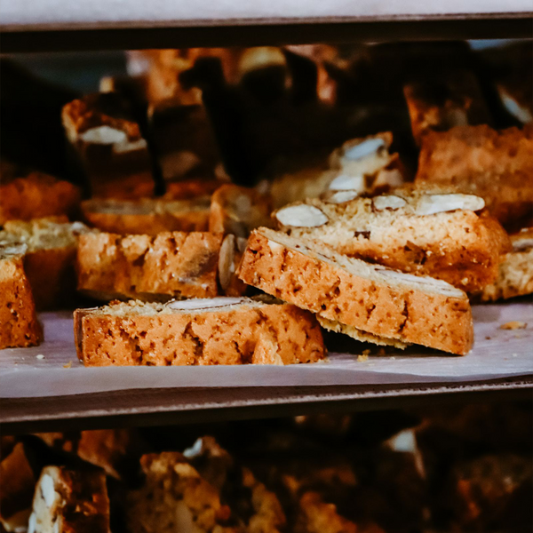 Biscuiterie de Forcalquier's crunchy almond croquants cookies from Provence on racks.