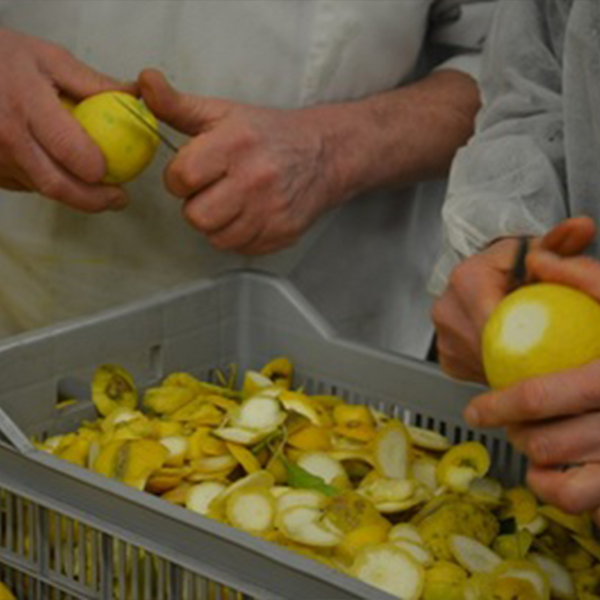 Our supplier Favols busy peeling fruits for their jams.