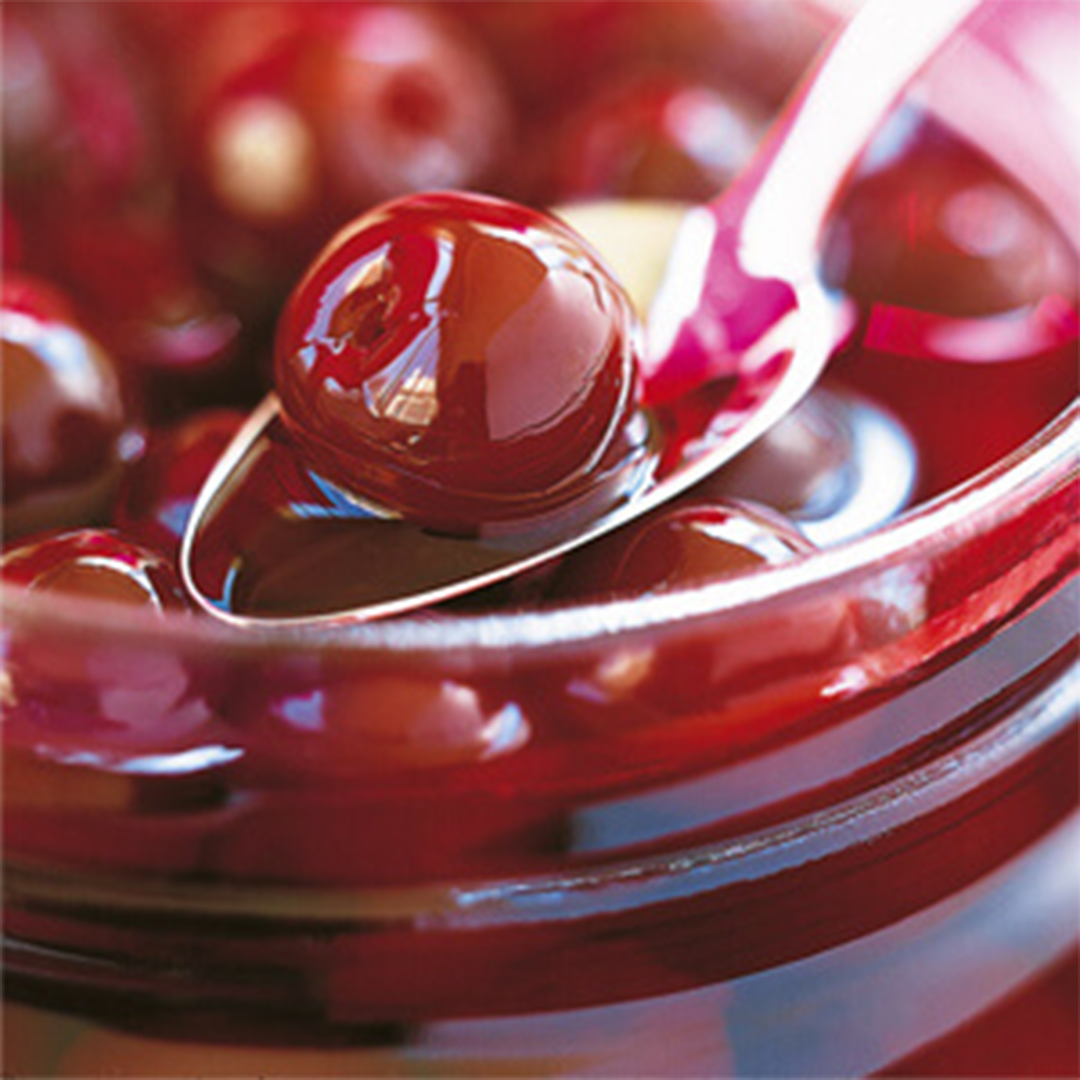 Opened jar of Distilleries Peureux&