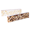Jonquier's nougat bars: 1 of white nougat in the background, 1 one of black nougat in the foreground. Net weight: 125g