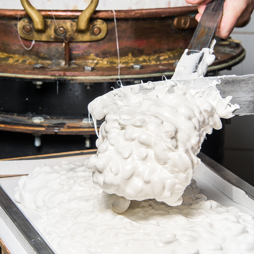 Preparation of nougat being ready, taken from the copper cauldron to put into a dish to be cut into bars later on, at Jonquier&