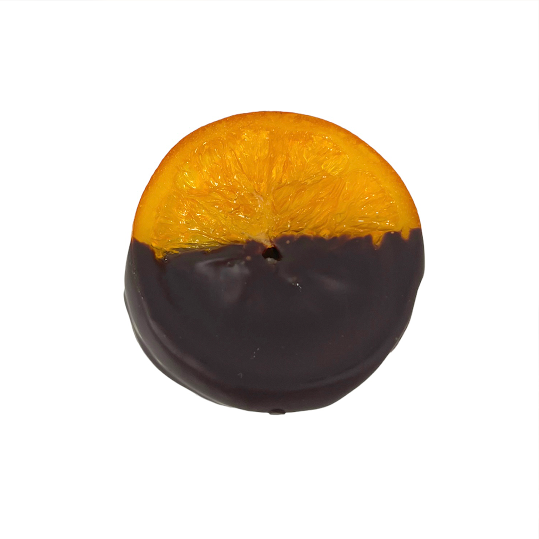 Slice of fresh orange slice candied &amp; dipped in 70% gluten-free, vegan dark chocolate. They are hand-dipped in fairtrade cocoa by our master chocolatier Voisin. Sold in bags of about 145g (5 or 6 slices)