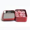 Confiserie des Hautes Vosges' collector tin of raspberry frosted candies opened