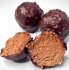 Two dark rochers with one in the front cut in two 