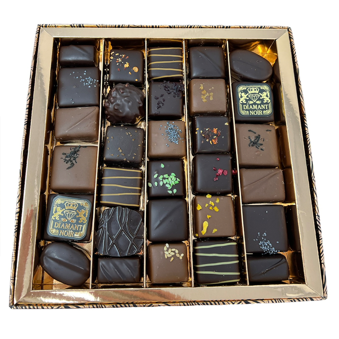 Close up of opened box of 30 assorted chocolates