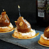 Recipe with Guintrand's whole Williams pear in syrup with caramel. Pears on top of biscuits with almonds.