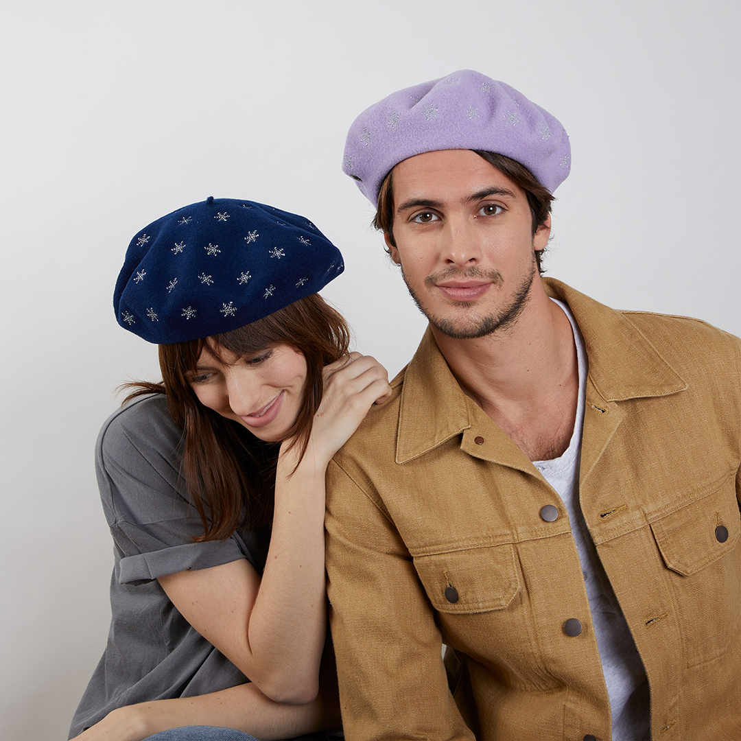 Two models wearing berets