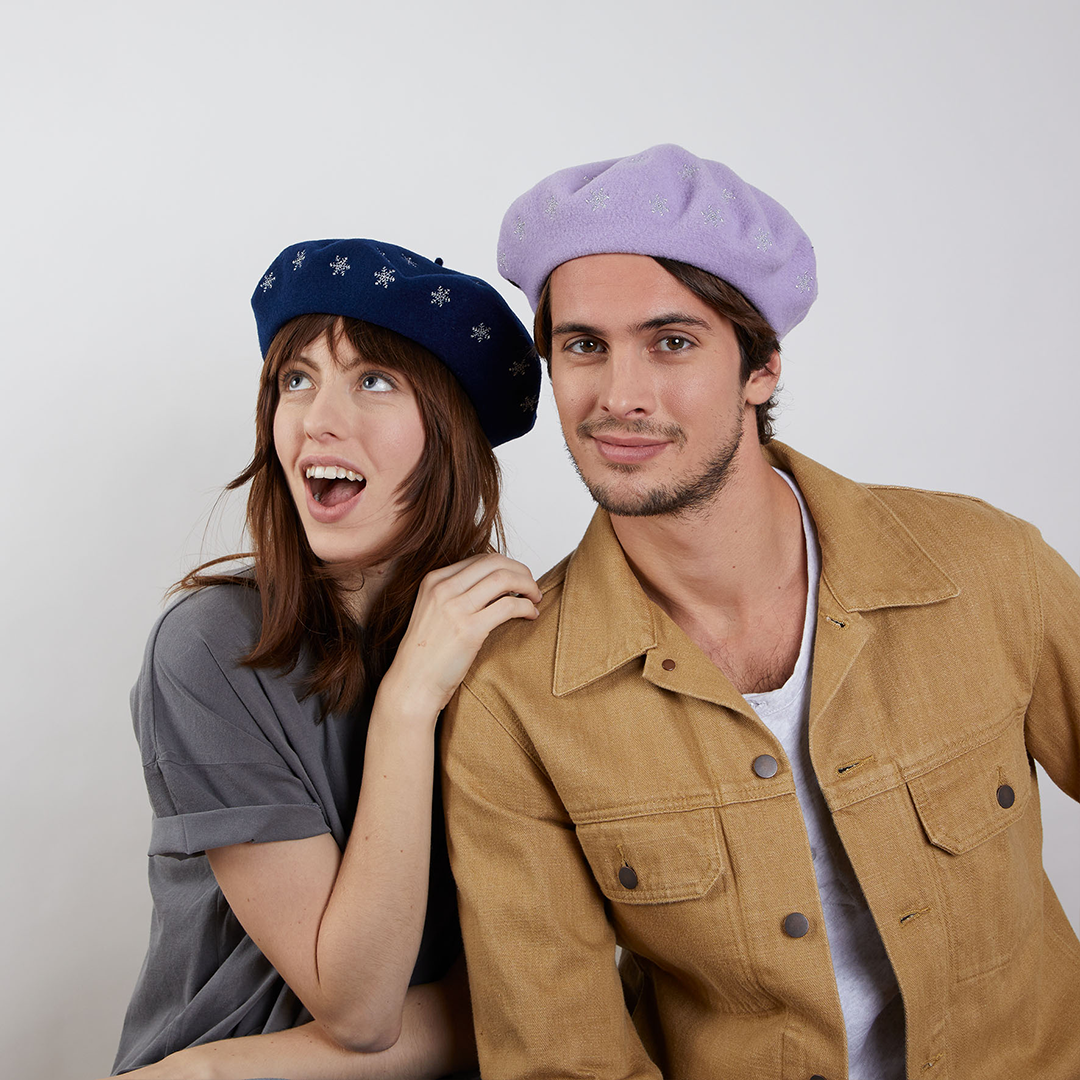 Two models wearing berets