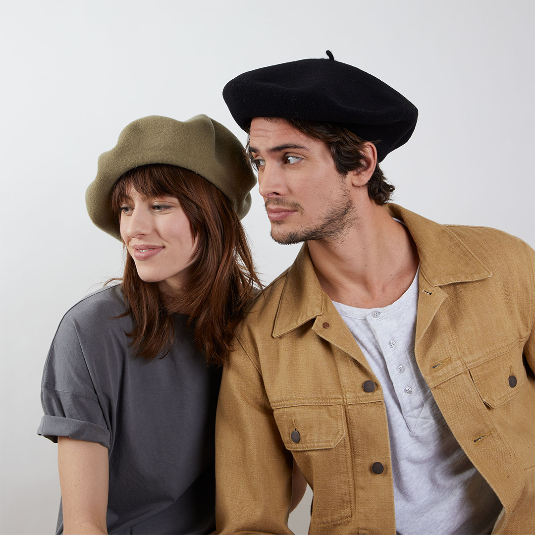 Two models wearing Max berets