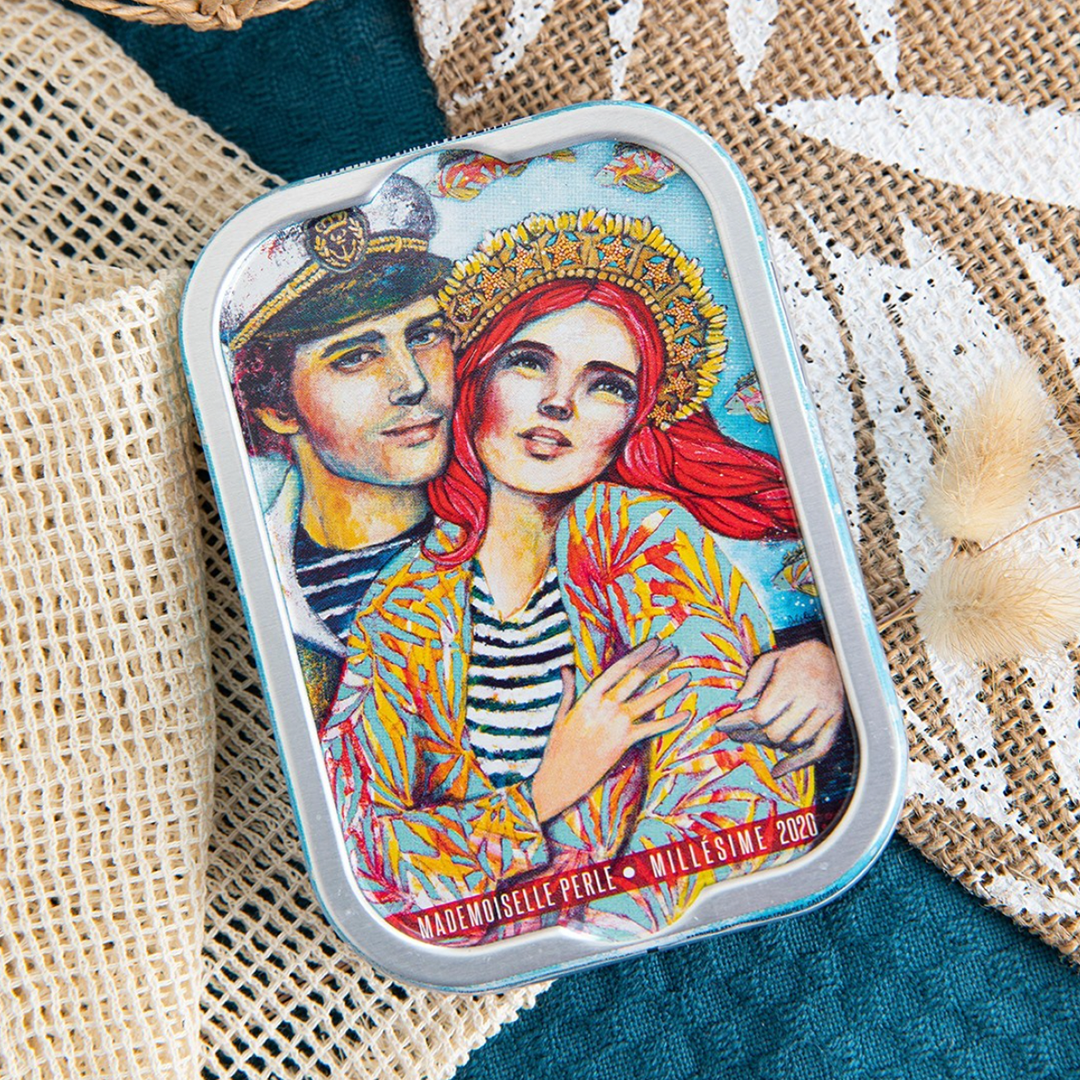 Tin of La Perle des Dieux' vintage sardines, year 2020 in  a kind of marin background.