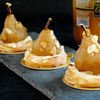 Recipe with Guintrand's whole Williams pear in syrup with vanilla. Pears on top of biscuits with almonds.